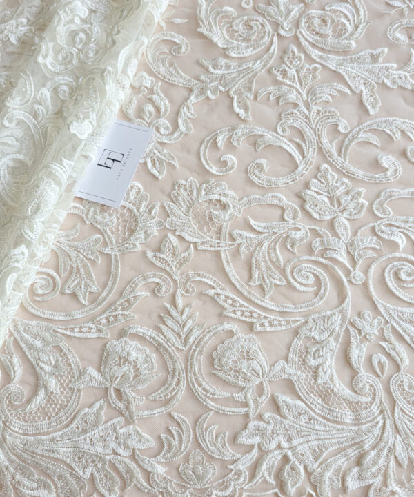 Ivory beaded lace fabric