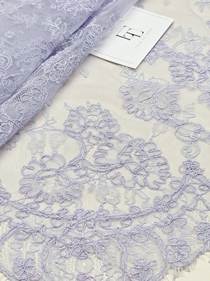 Purple Chantilly lace fabric with cord