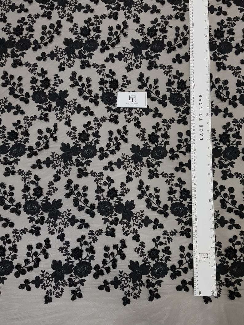 Black lace fabric with flowers Stock Photo by ©Whiteaster 53973041