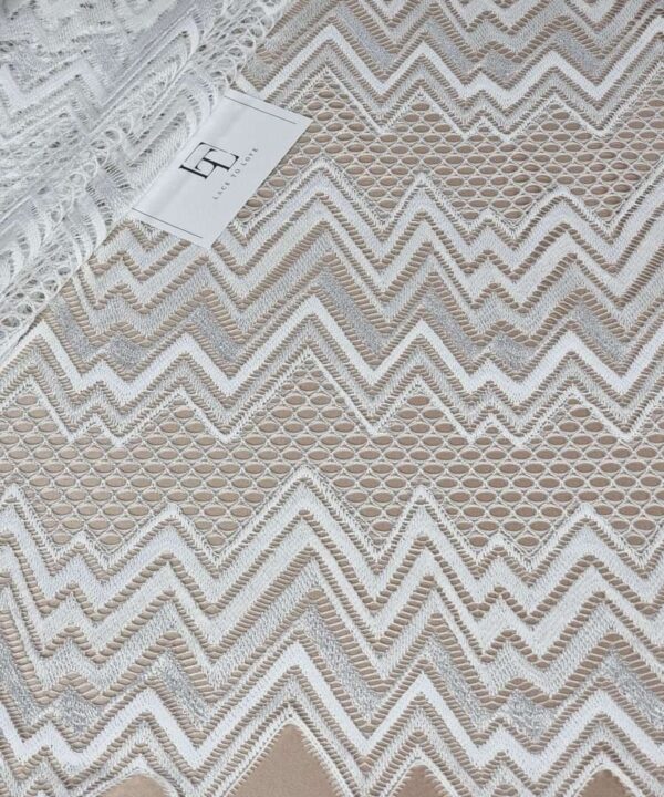Ivory geometric lace fabric