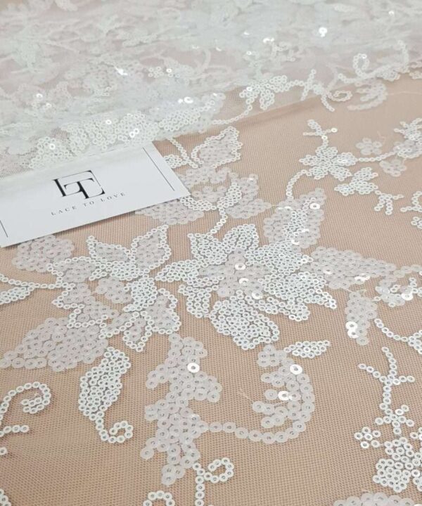 Ivory lace fabric with sequins