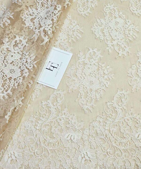 Beige Chantilly lace fabric