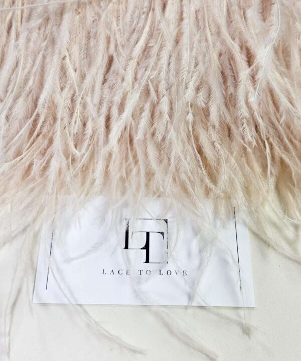 Real dyed ostrich feathers on band
