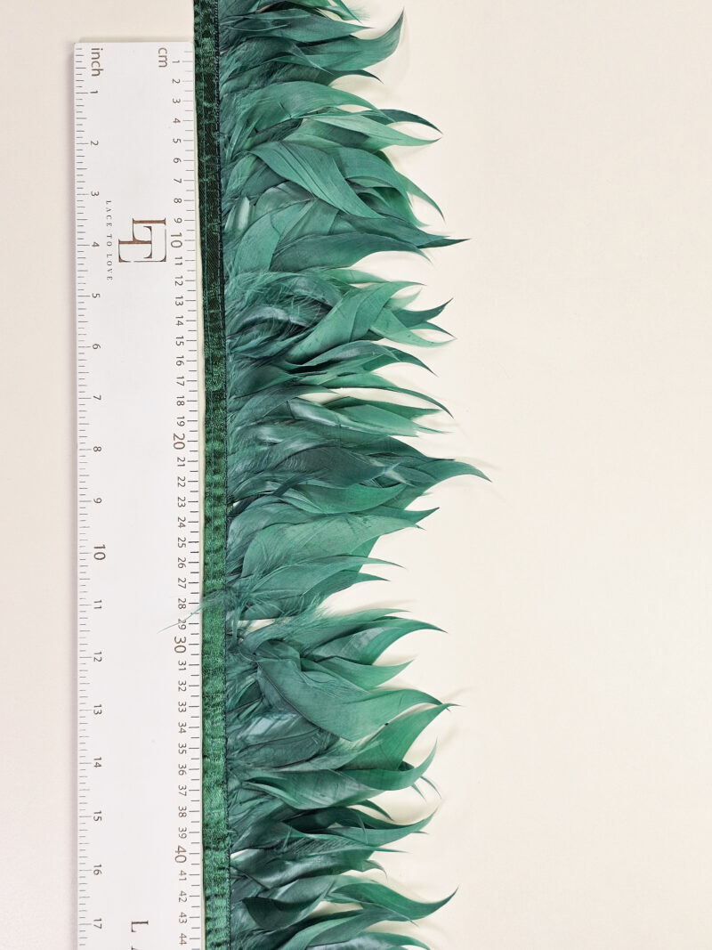 Bright green goose feather fringe on a ribbon