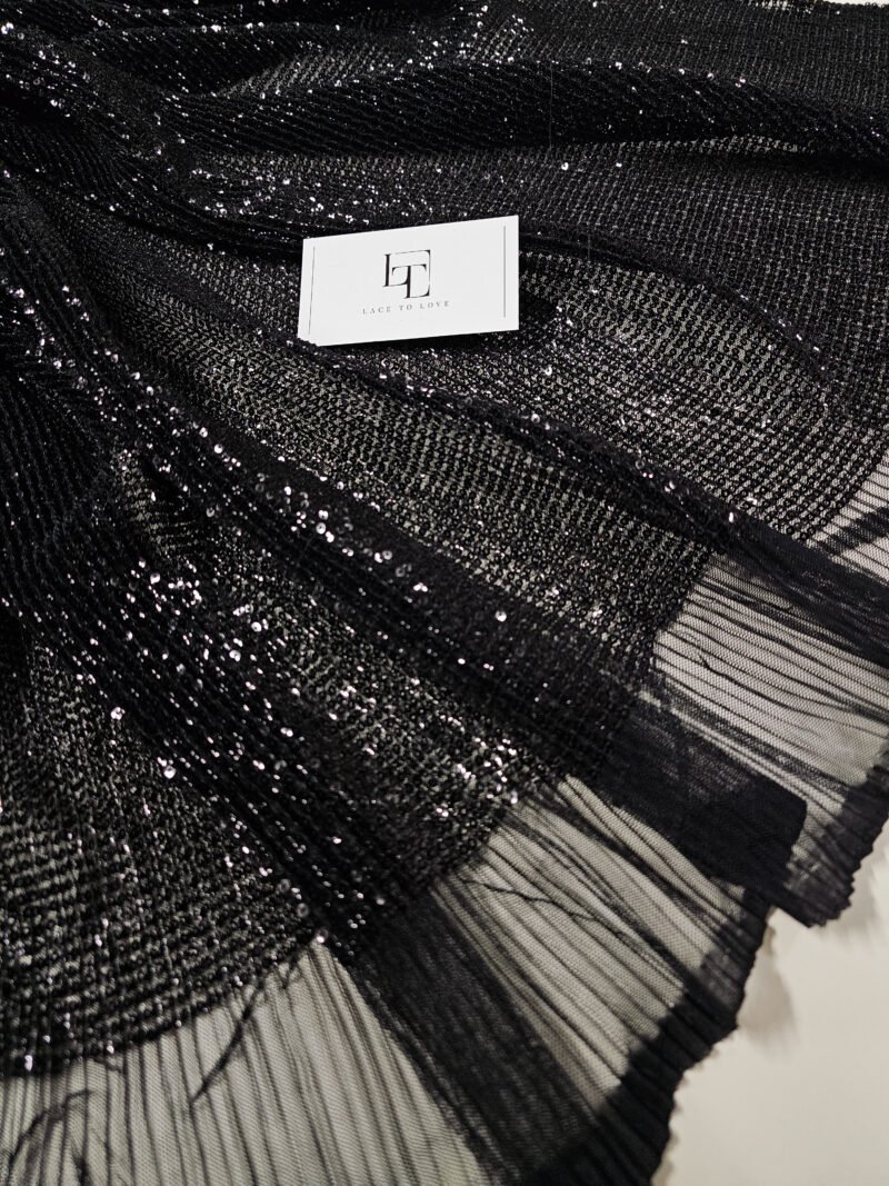 Black delicate tulle fabric pleated