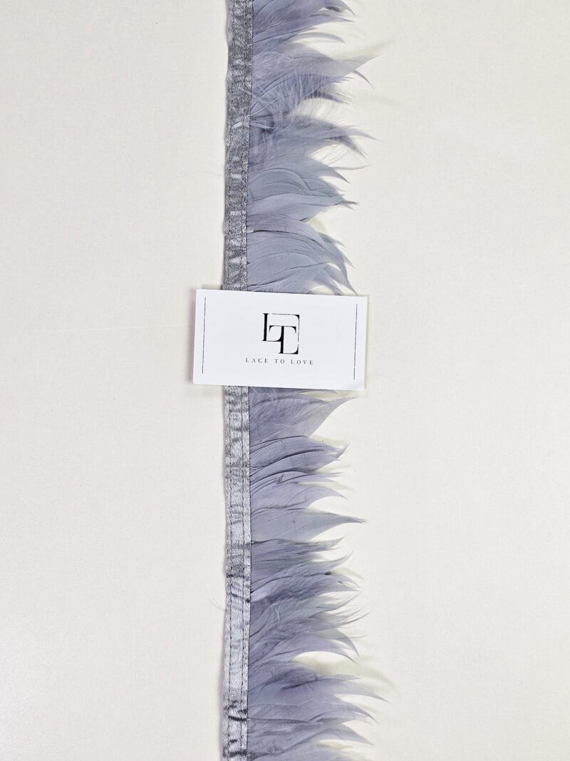 Bright grey goose feather fringe on a ribbon