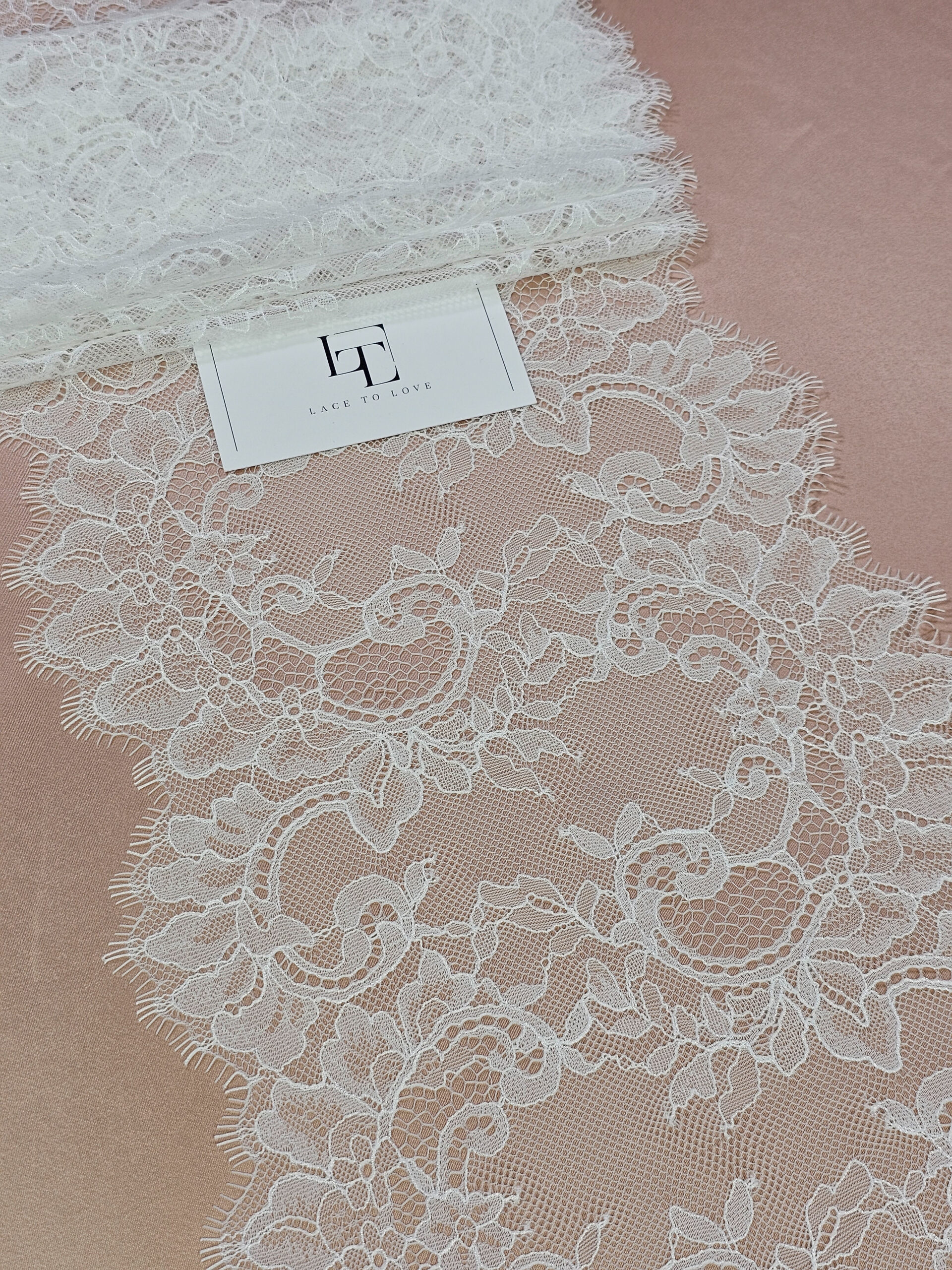 https://lacetolove.com/wp-content/uploads/2023/12/Ivory-French-Chantilly-lace-trimming-buy-online-by-the-meter-scaled.jpg