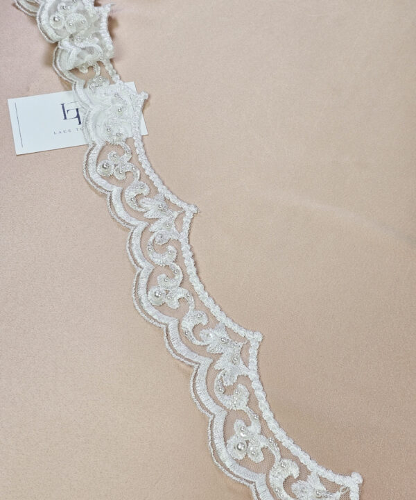 Off white beaded embroidery lace fabric trim sold by the yard