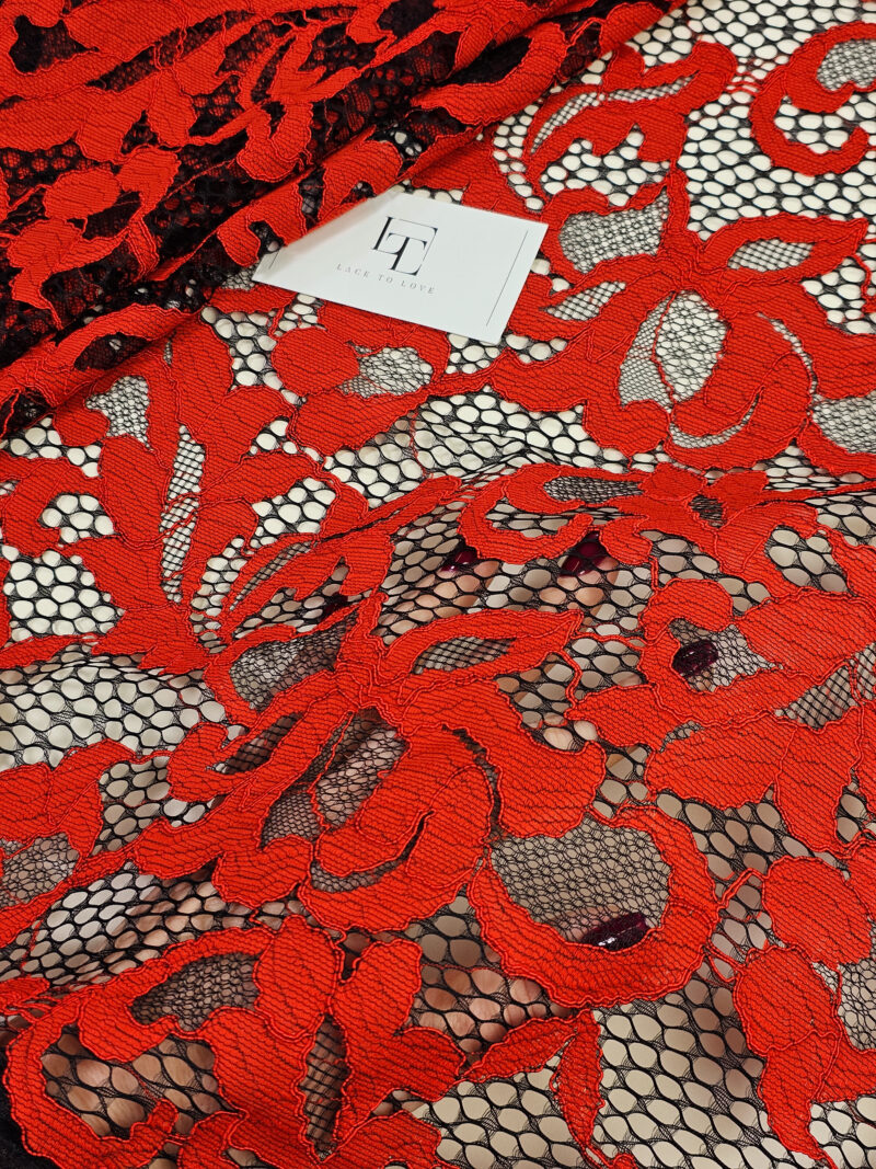 Orange black lace cloth sold by the yard