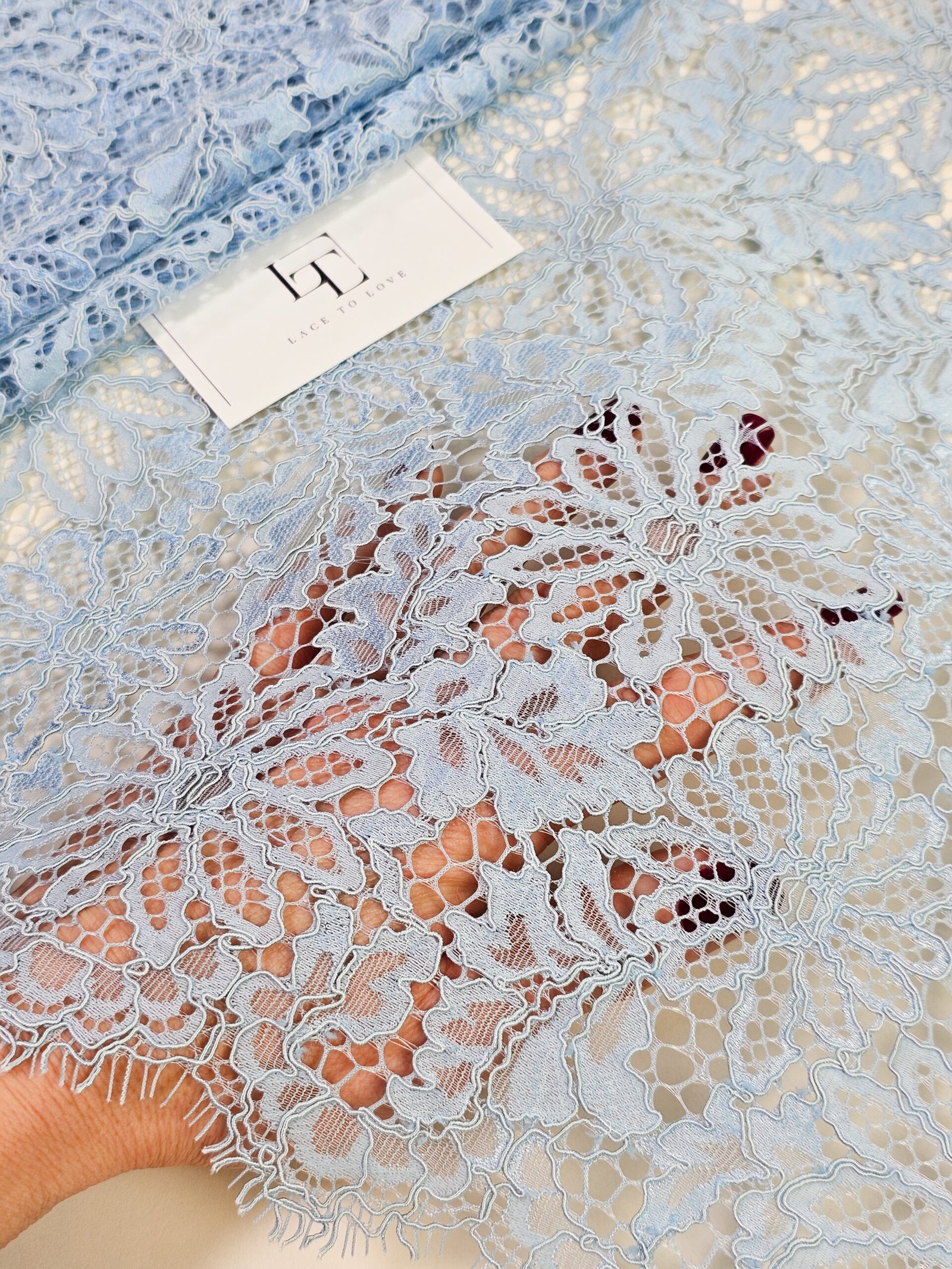 Heavy pale blue lace fabric