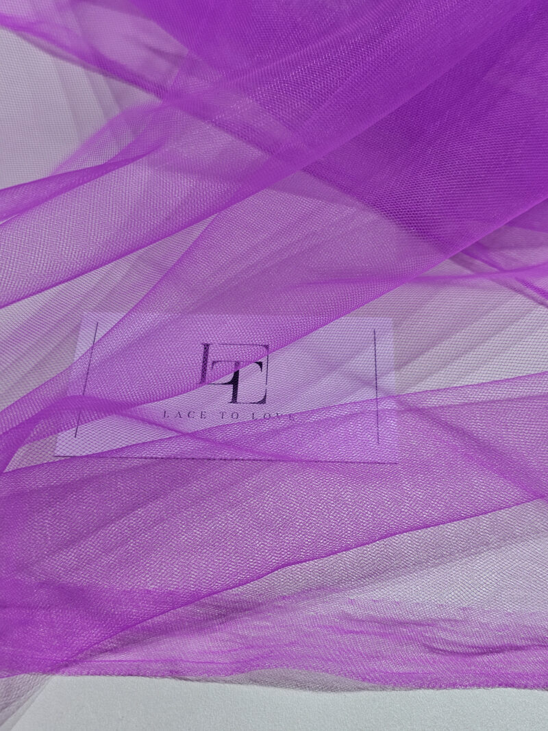 Purple soft well draping delicate tulle fabric