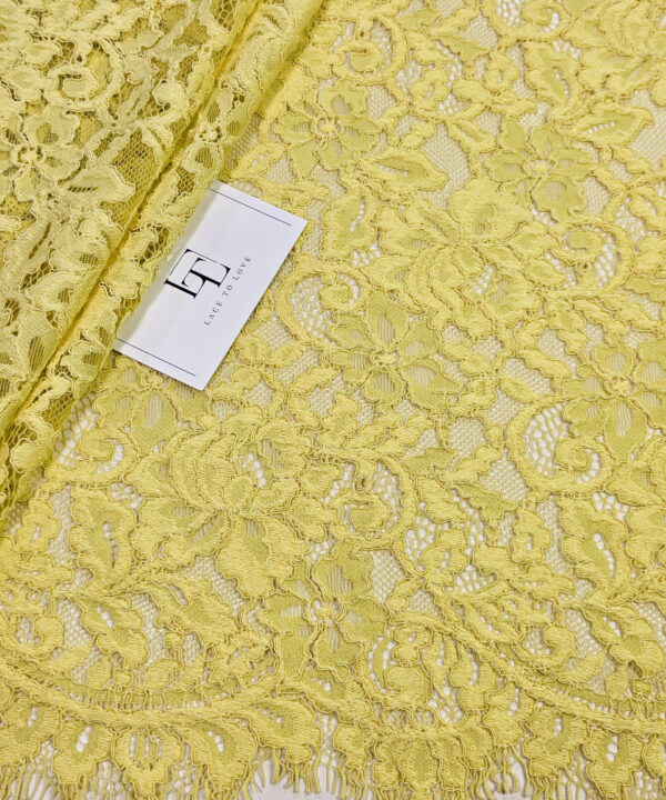 Yellow lace cloth sold by the yard