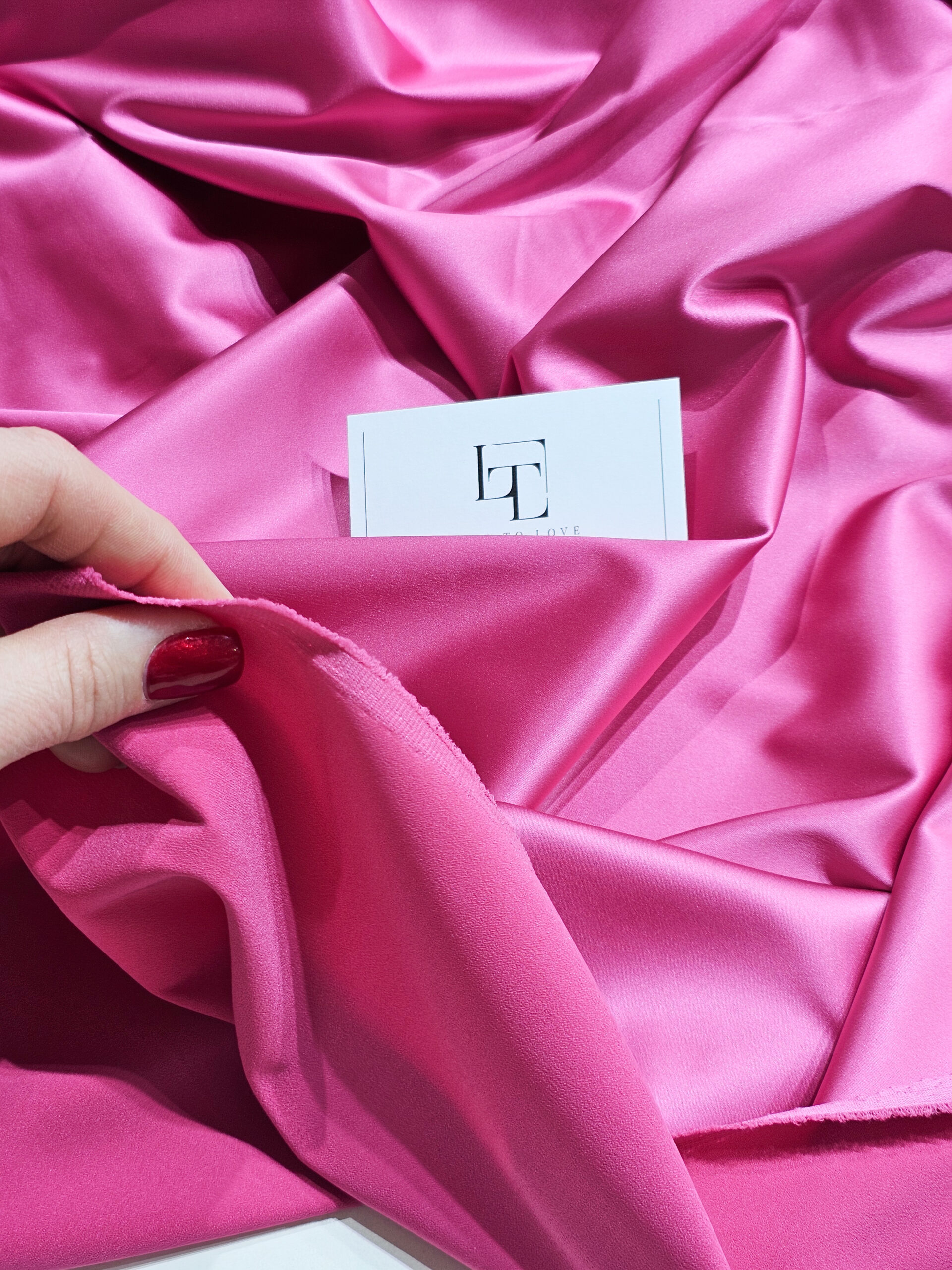 Pink elastic stretch satin fabric