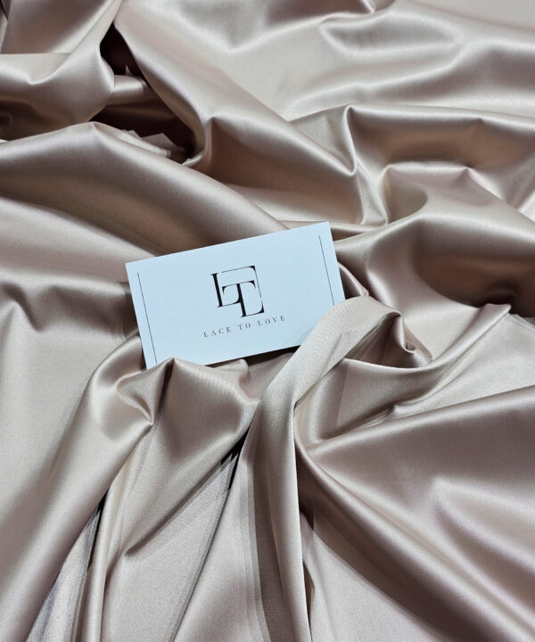 Beige elastic stretch satin fabric