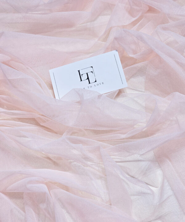 Pale pink soft tulle fabric