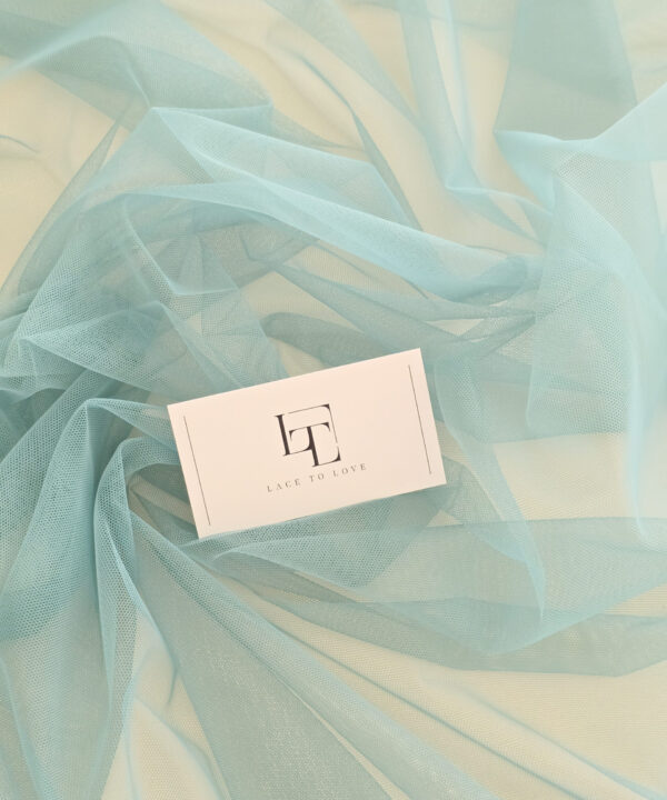 Dusty green soft well draping delicate tulle fabric