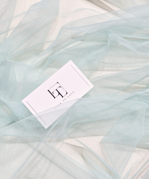 Pale green soft well draping delicate tulle fabric