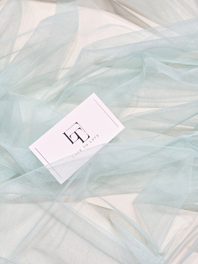 Pale green soft well draping delicate tulle fabric