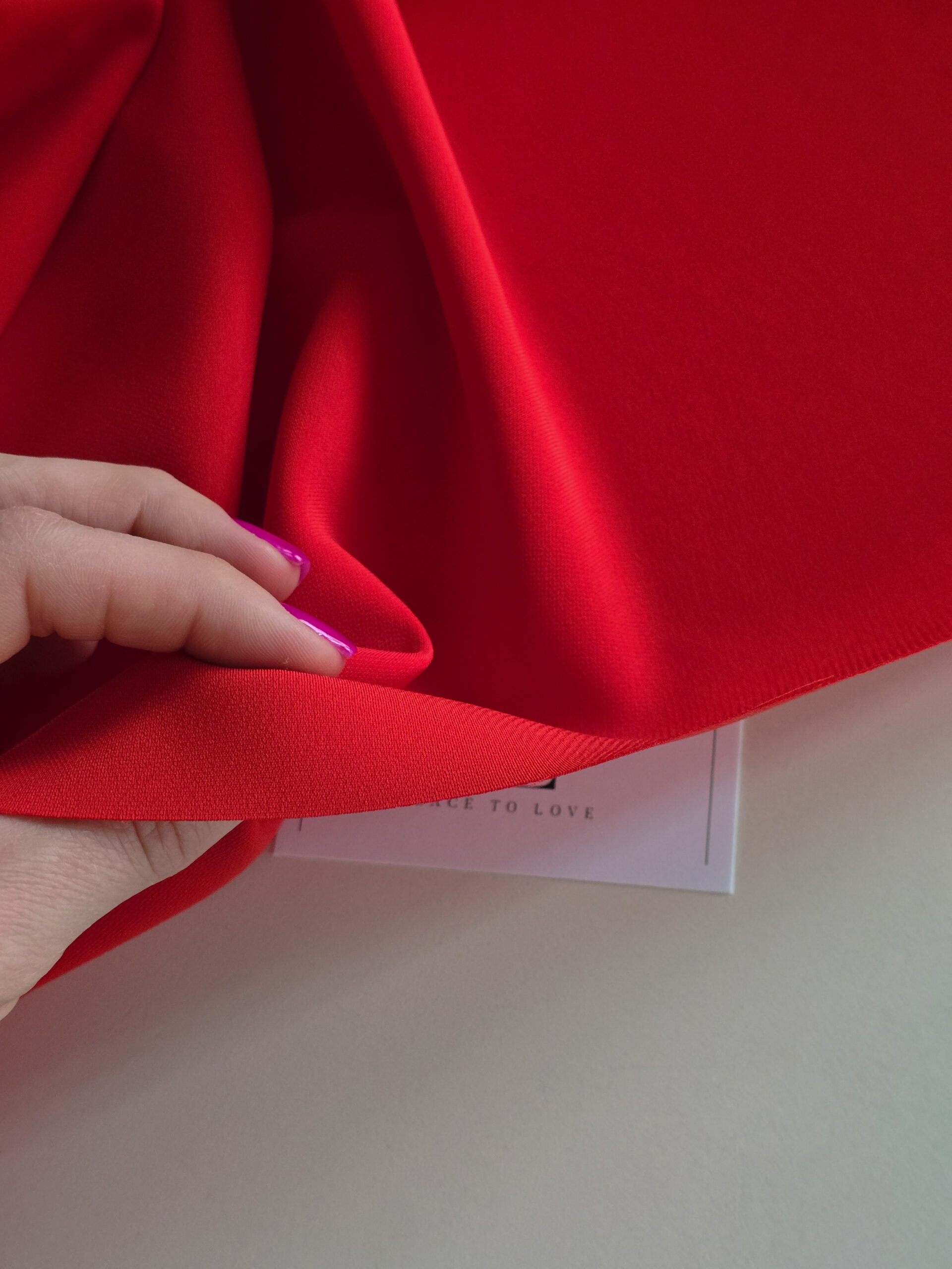 Red delicate elastic crepe fabric