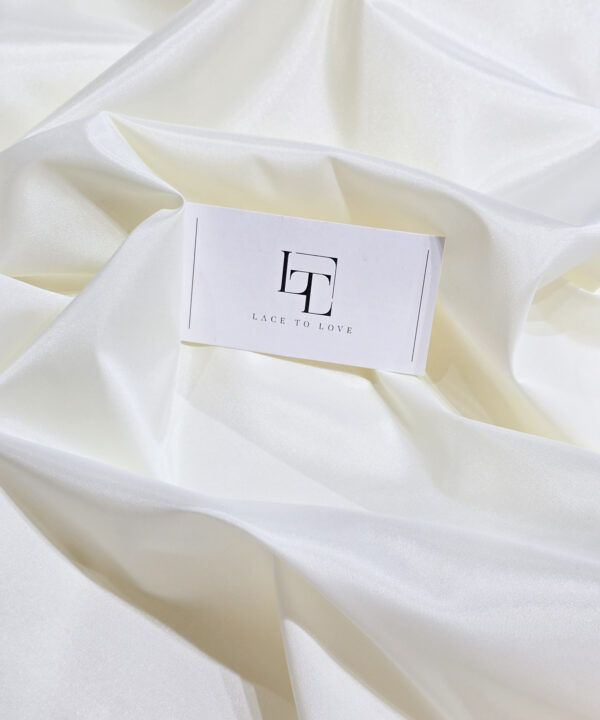 Light ivory elastic stretch lining fabric