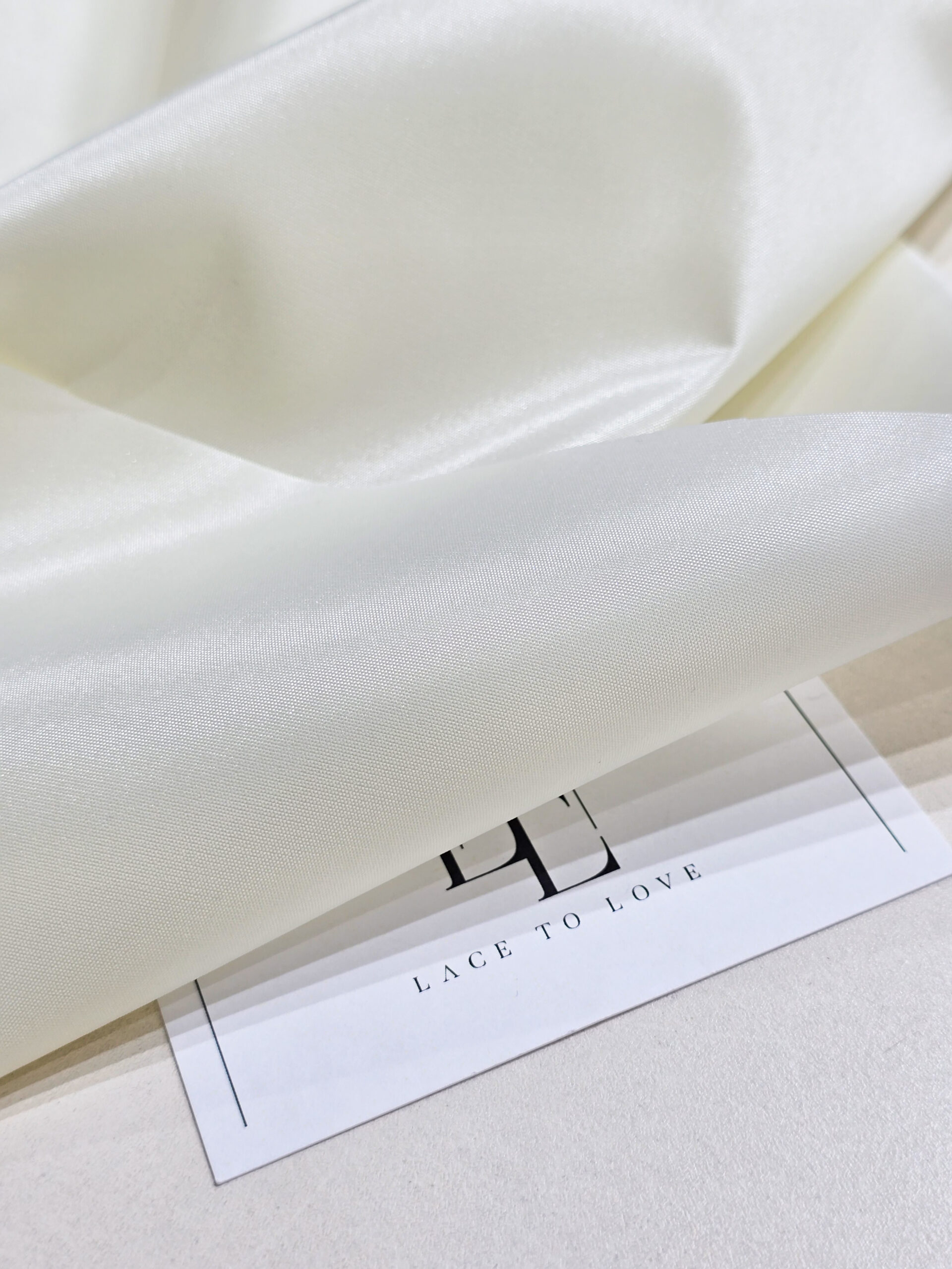 Ivory color elastic bridal lining fabric