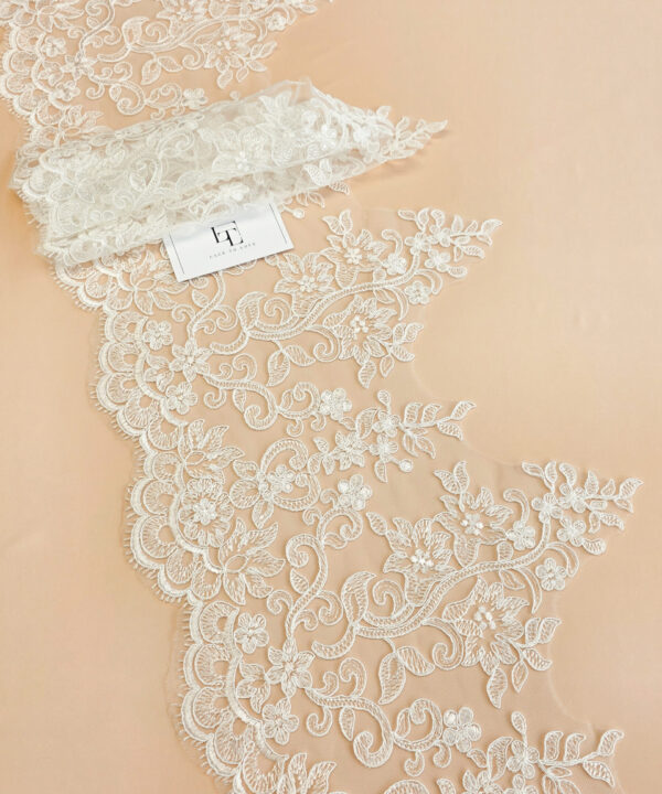 Light ivory French Chantilly lace fabric buy online by the meter