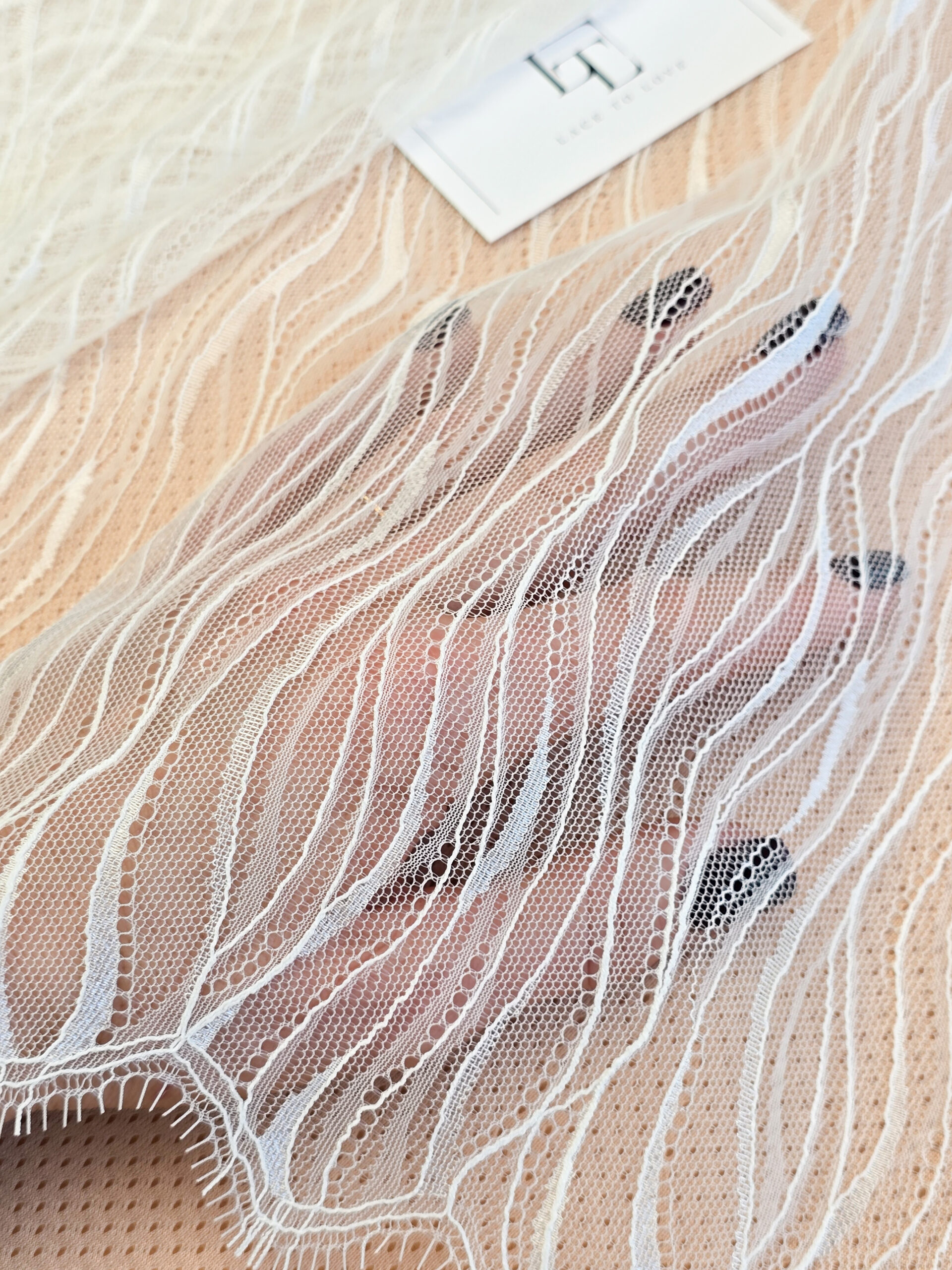 Light ivory French Chantilly lace fabric buy online by the meter