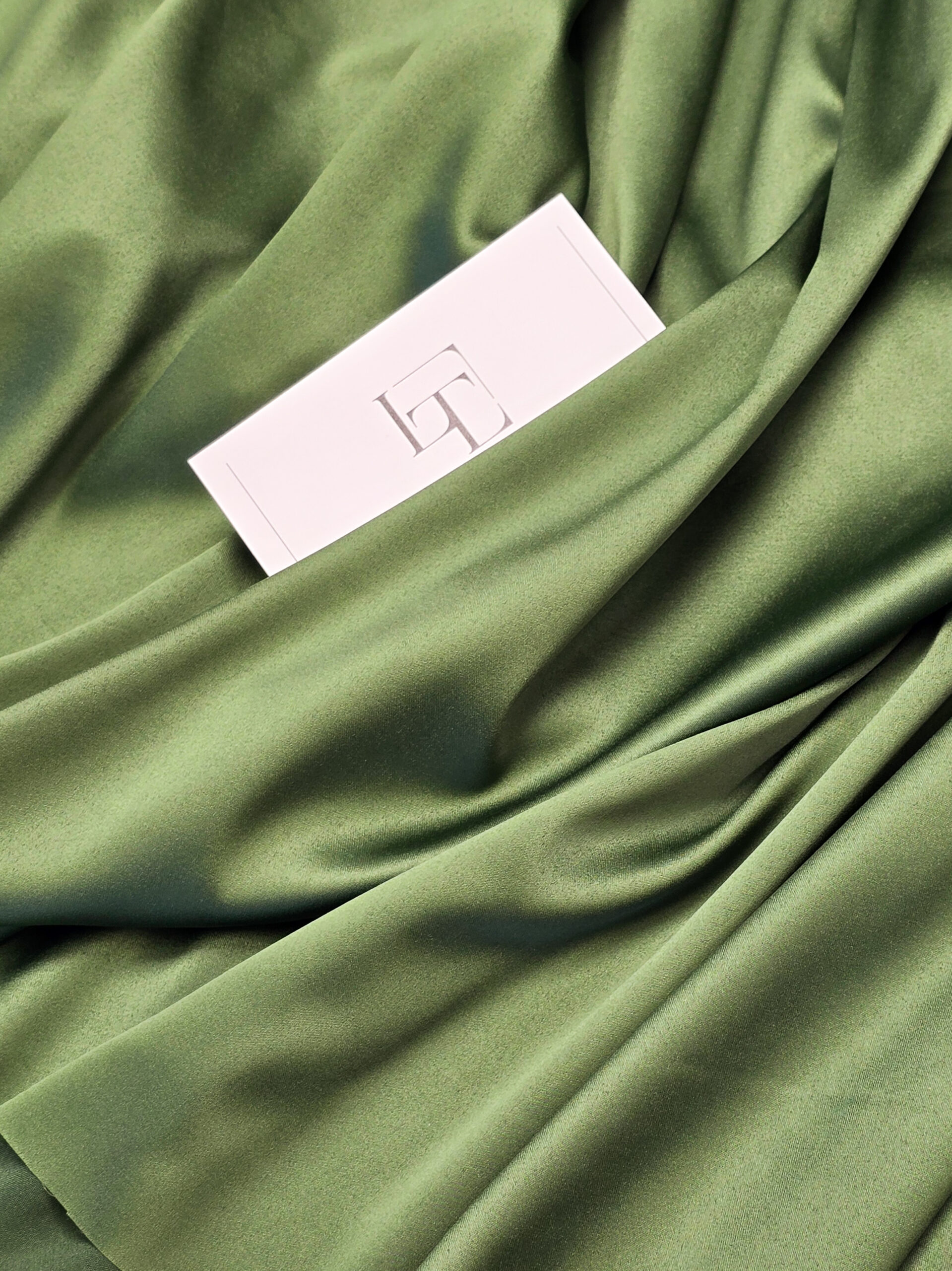 Moss green color stretch elastic satin fabric