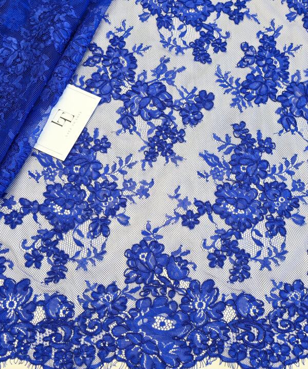 Blue Chantilly lace fabric with cord