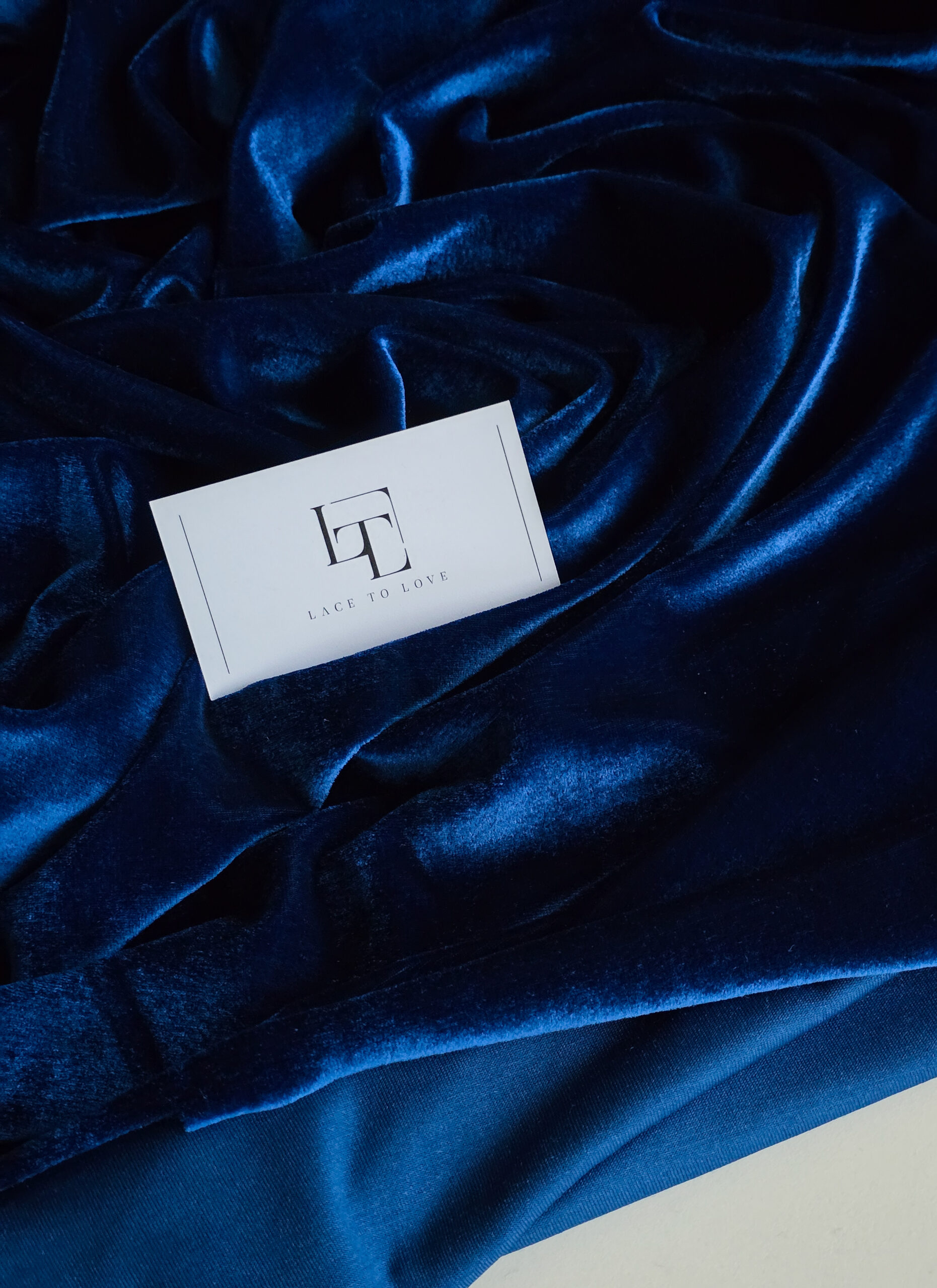 Dark blue smooth stretch velvet velour material