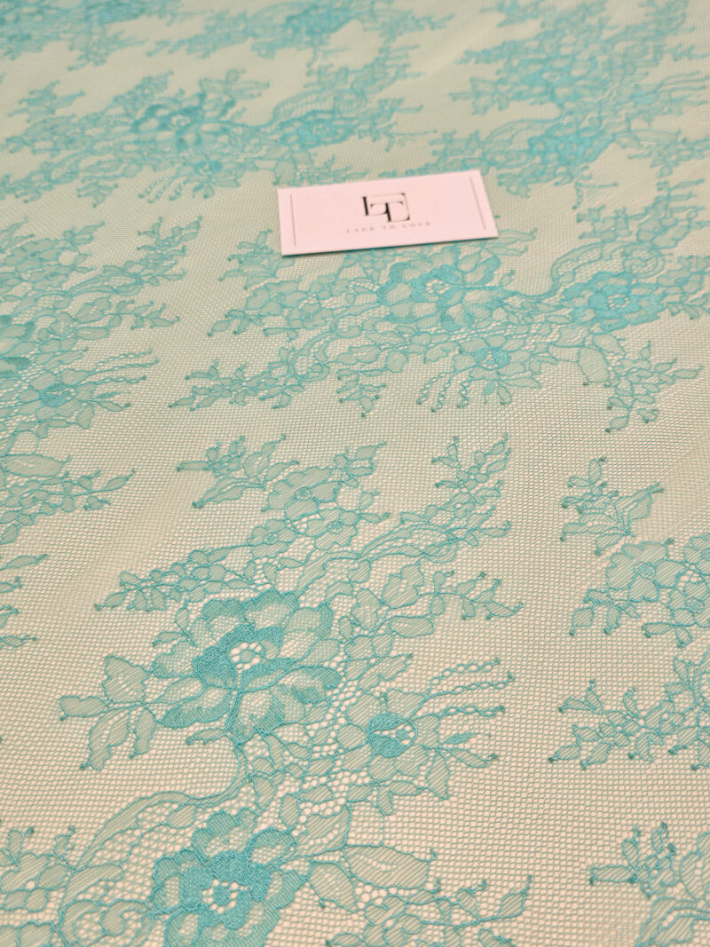 Blue Chantilly lace fabric with cord