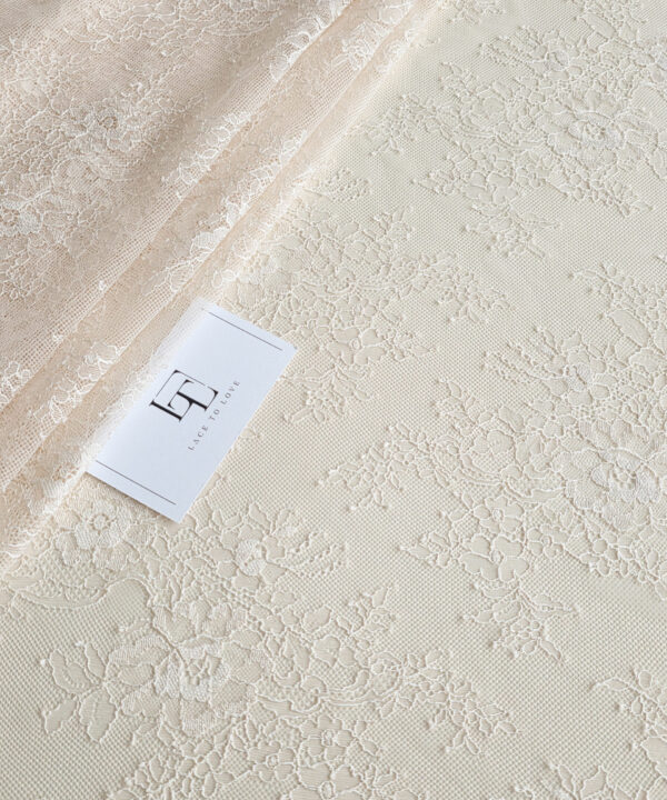 Light pink French Chantilly lace fabric buy online by the meter