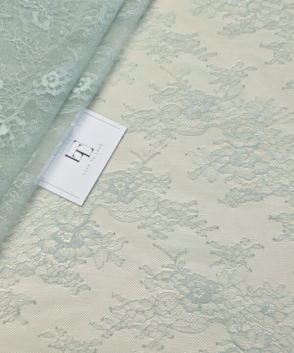Delicate pale green lace fabric
