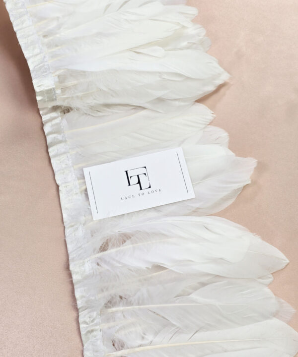 Pure white goose feather fringe on a ribbon