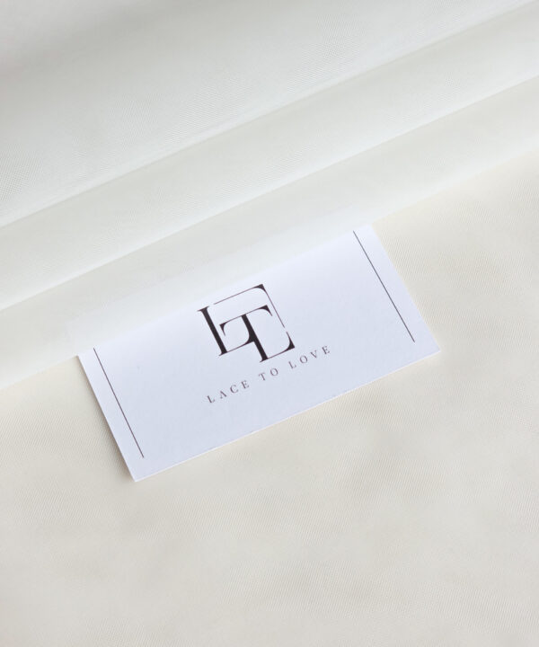 Delicate off white tulle fabric