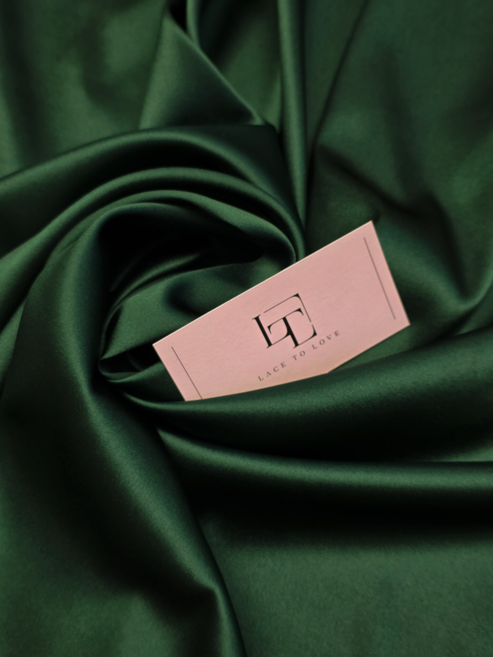 Dark green stretch silk satin fabric