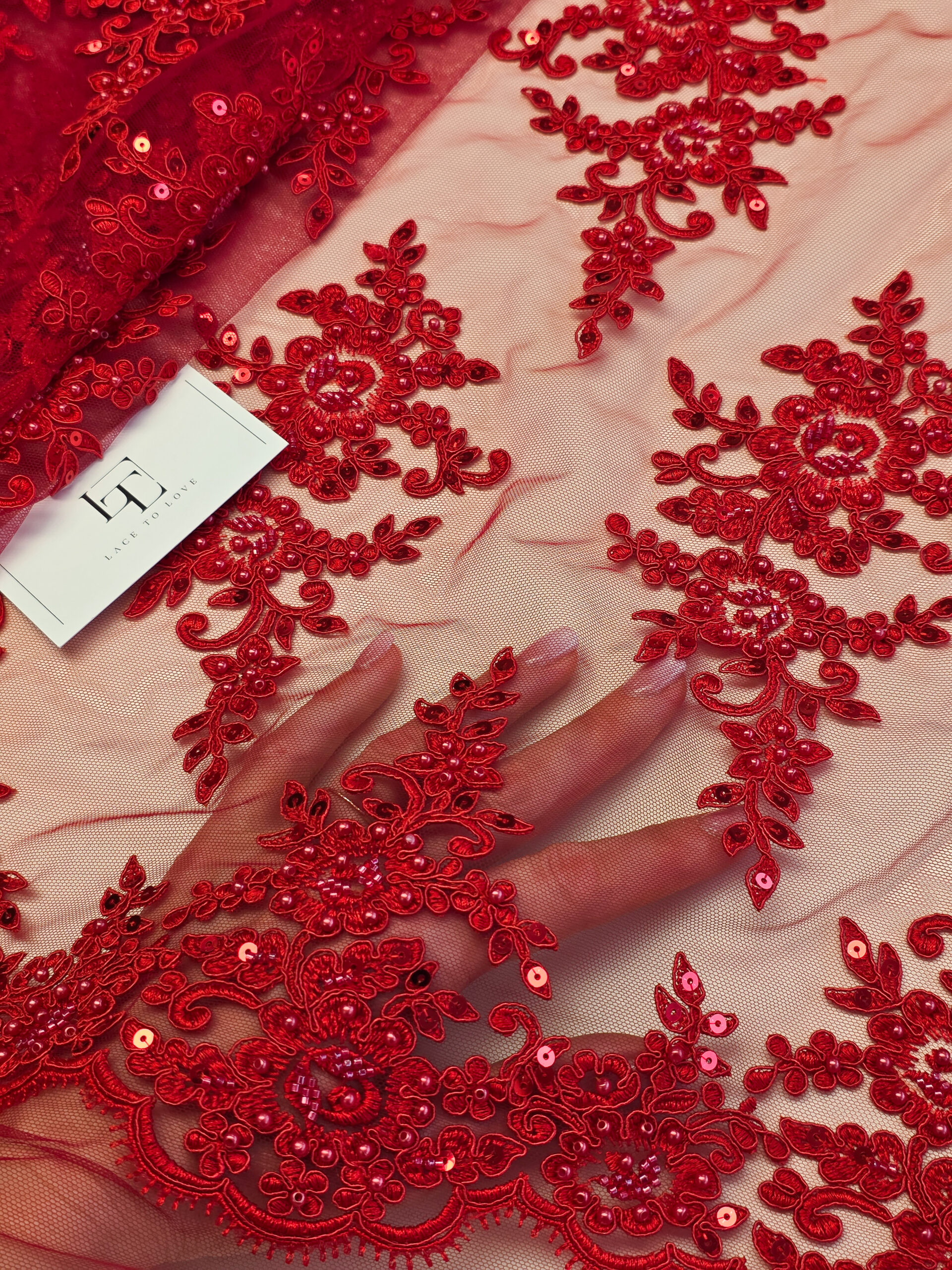 Red beaded lace fabric Red beaded lace fabric