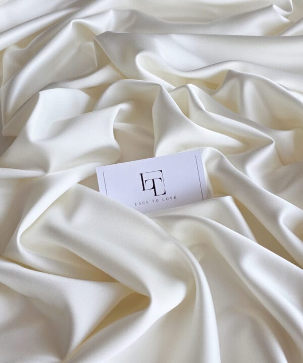 Ivory stretch satin fabric
