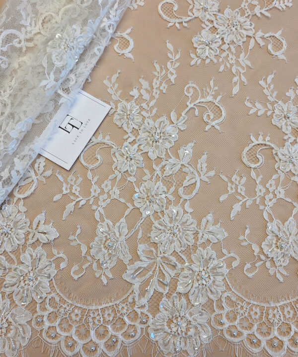 Beaded ivory Chantilly lace fabric