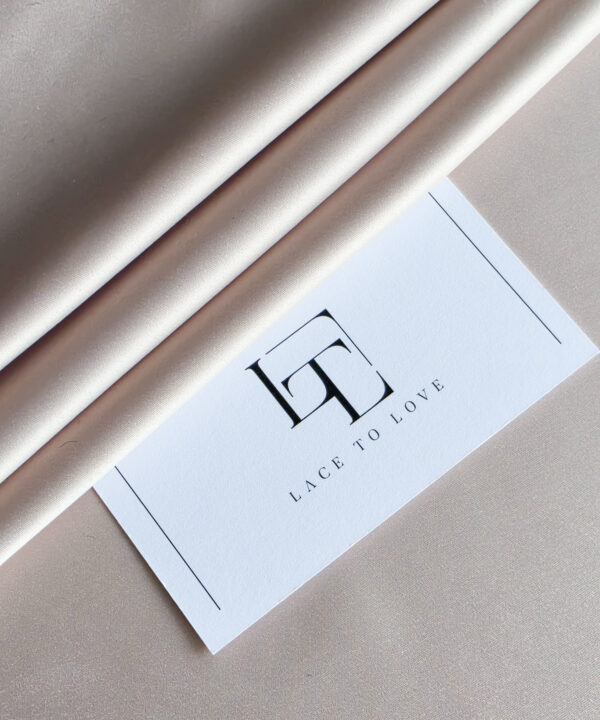 Blush pink stretch satin fabric