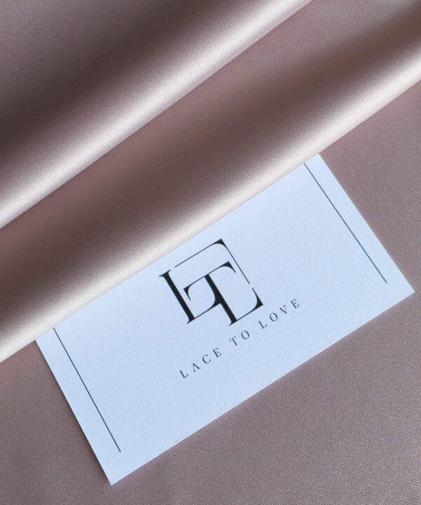 Grayish beige stretch satin fabric