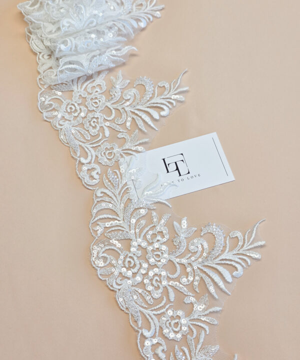 Off white beaded embroidery lace fabric trim sold by the yard