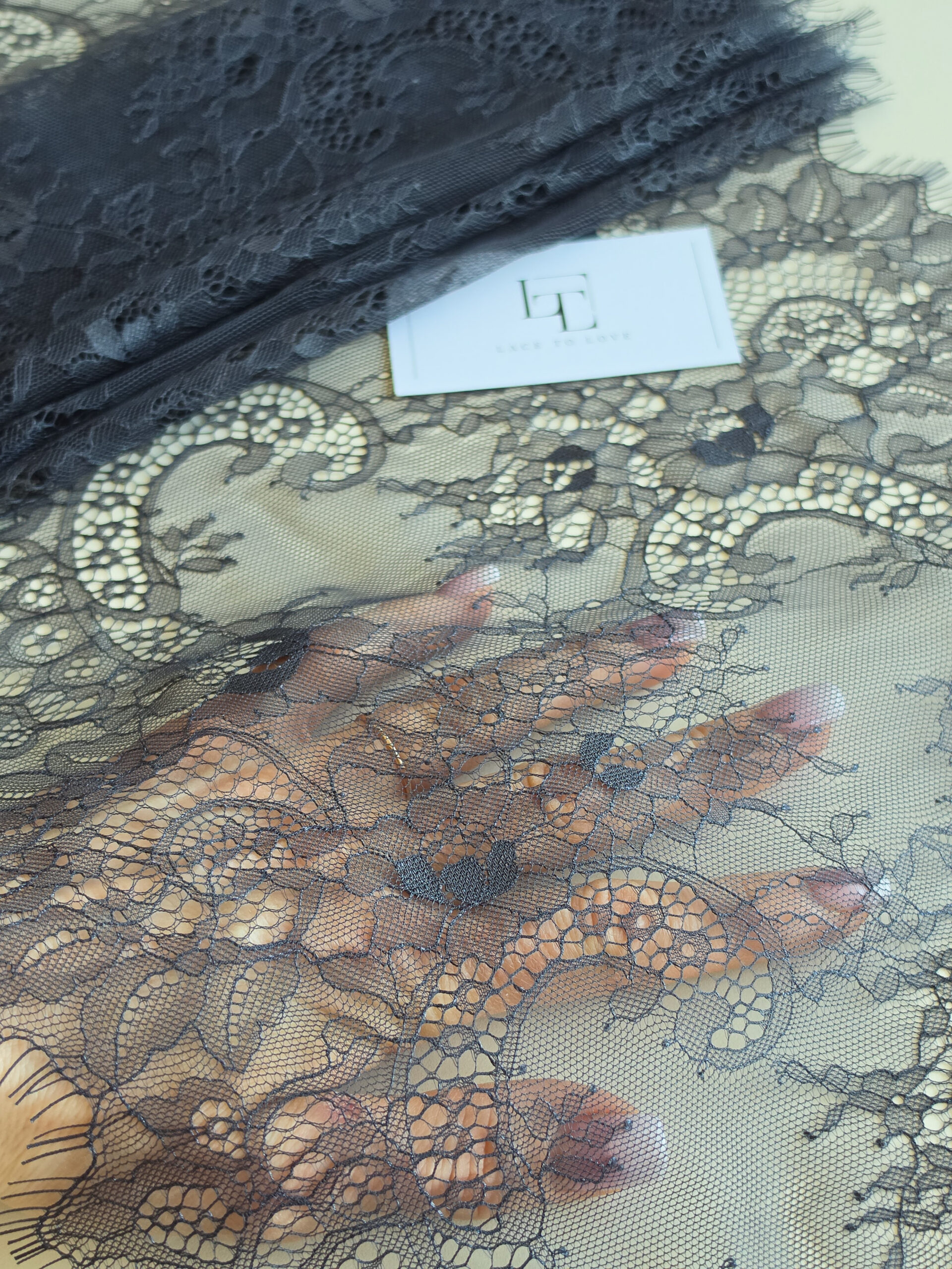 Delicate dark gray lace edging