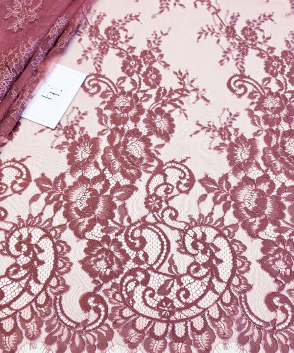 Delicate dusty pink lace fabric