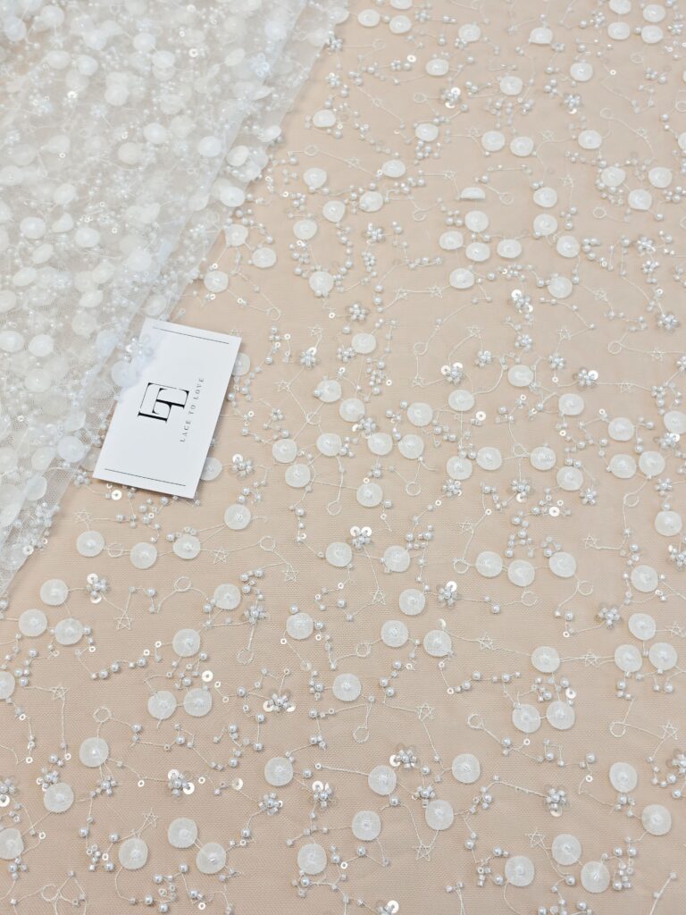 Light ivory embroidered 3D lace fabric buy online by the meter