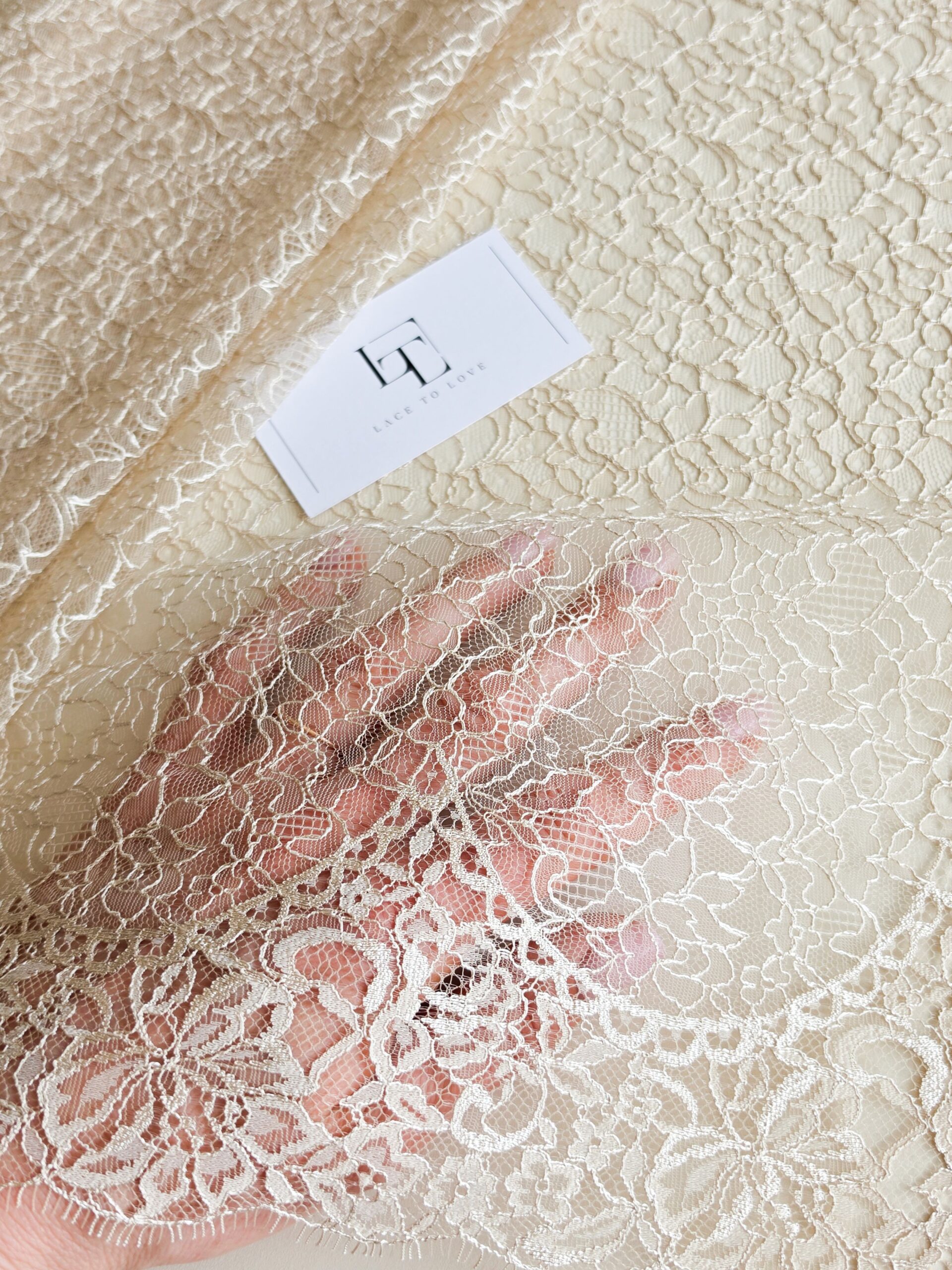 Delicate beige lace fabric