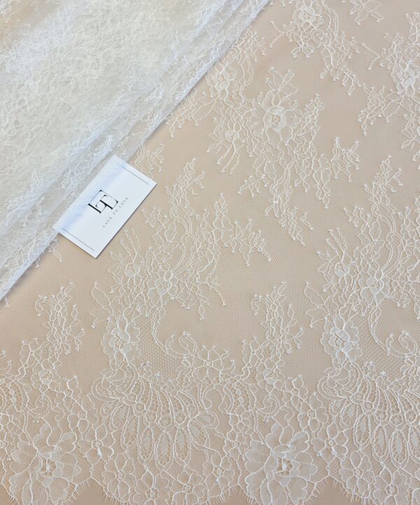 Light ivory French Chantilly lace fabric buy online by the meter