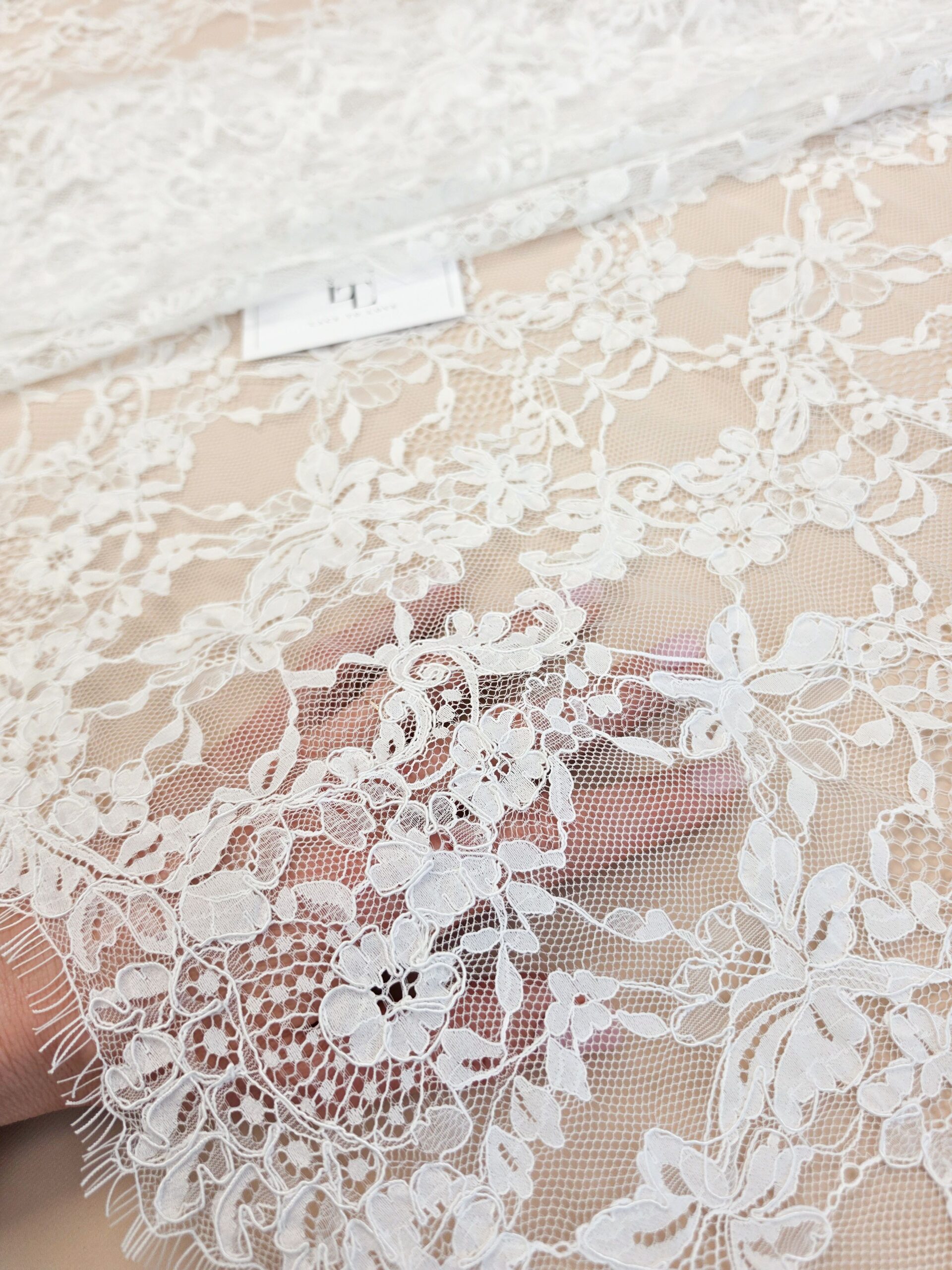 Delicate off white bridal lace fabric