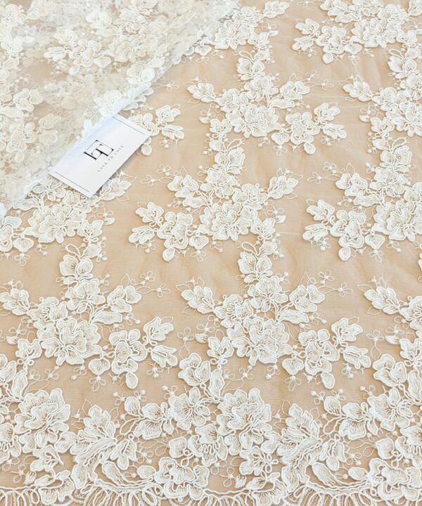 Light ivory French Chantilly lace fabric buy online by the meter