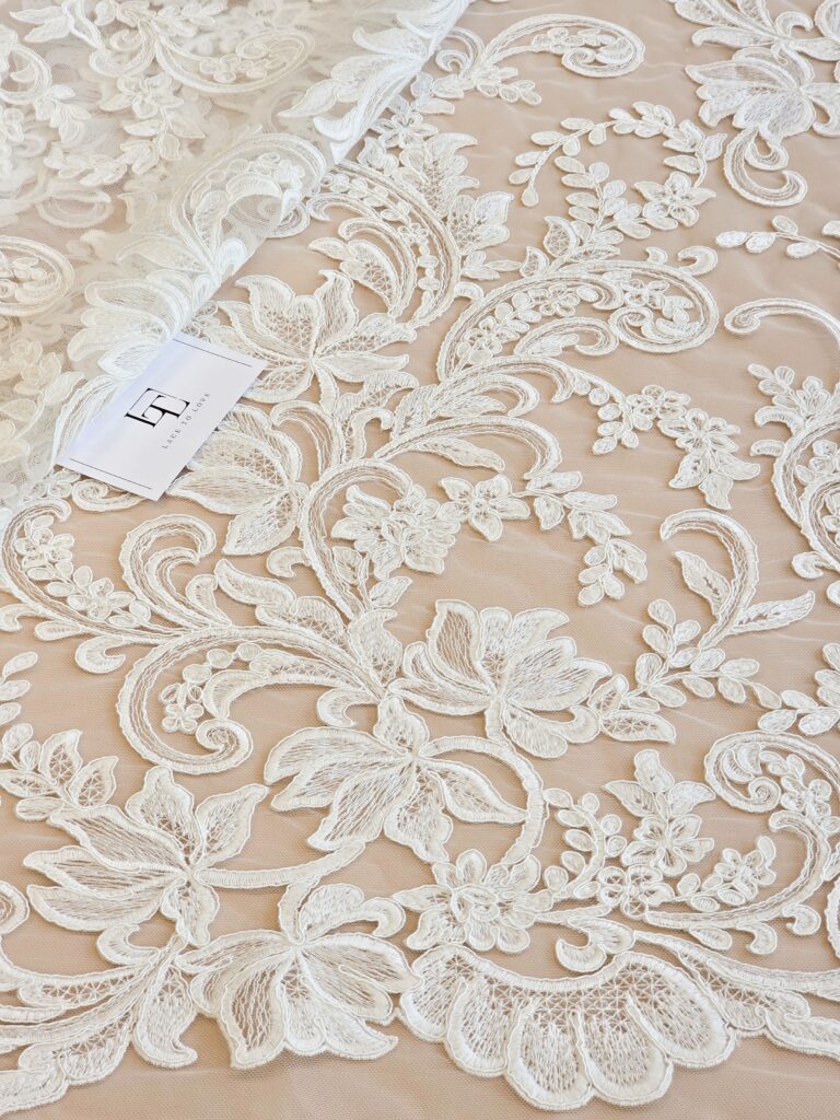 Light ivory French Chantilly lace fabric buy online by the meter